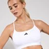 ADIDAS Aeroreact Training 3-Stripes Bra - White 1 ADIDAS Aeroreact Training 3-Stripes Bra - White -The Sports Edit Store Adidas AERCT LIGHT SUPPORT BRA WHITE JG1403 0004