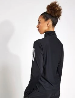 ADIDAS Own The Run Half-Zip Jacket - Black -The Sports Edit Store Adidas OWN THE RUN B HALF ZIP IK7440 BLACK 0017