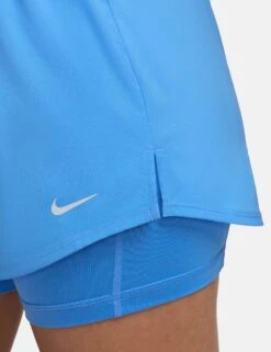 Nike One Dri-FIT 2-in-1 Shorts - University Blue/Reflective Silver -The Sports Edit Store nike one dri fit 2 in 1 shorts blue silver dx6016 412 5