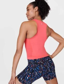 Sweaty Betty Athlete Crop Seamless Gym Vest - Coral Pink -The Sports Edit Store sweaty betty athlete crop seamless gym vest coral pink sb6545c 2