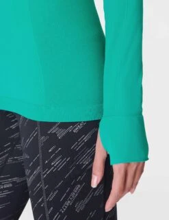 Sweaty Betty Athlete Seamless Gym Long Sleeve Top - Gem Green -The Sports Edit Store sweaty betty athlete seamless gym long sleeve top green sb6547 4