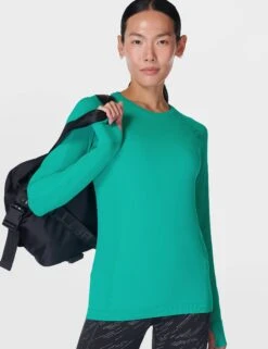 Sweaty Betty Athlete Seamless Gym Long Sleeve Top - Gem Green -The Sports Edit Store sweaty betty athlete seamless gym long sleeve top green sb6547 5