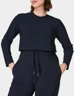 Sweaty Betty Explorer Long Sleeve Jumpsuit - Black -The Sports Edit Store sweaty betty explorer long sleeve jumpsuit black sb8506 fl 3