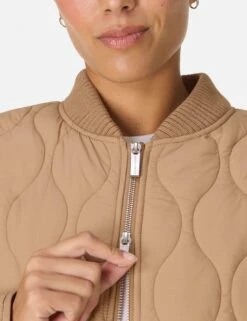 Sweaty Betty On The Move Jacket - Golden Beige -The Sports Edit Store sweaty betty on the move jacket golden beige sb10379 3
