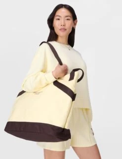 Sweaty Betty SB Canvas Bucket Bag - Buttercream Yellow -The Sports Edit Store sweaty betty sb canvas bucket bag buttercream yellow sb10224 8