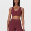 Sweaty Betty Ultimate Studio Voop Bra - Garnet Red -The Sports Edit Store sweaty betty ultimate studio voop bra garnet red sb10037 1