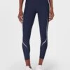 Sweaty Betty Zero Gravity 7/8 Illuminate Running Tight - Navy Blue -The Sports Edit Store sweaty betty zero gravity 7 8 illuminate running tight navy blue sb910378 4274 1