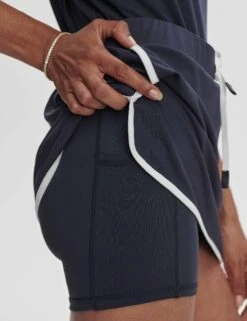 Varley Archer Mid Rise Skort 13.5" - Blue Nights -The Sports Edit Store varley archer mid rise skort 13 5in blue nights var02484 5