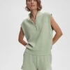 Varley Loretta Half-Zip Sleeveless Sweat - Snow Sage 1 Varley Loretta Half-Zip Sleeveless Sweat - Snow Sage -The Sports Edit Store varley loretta half zip sleeveless sweat snow sage var01892 1